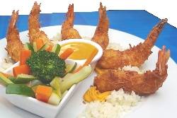 Os frutos do mar compõem os pratos de diversas cidades litorâneas. Prato Camarão Empanado